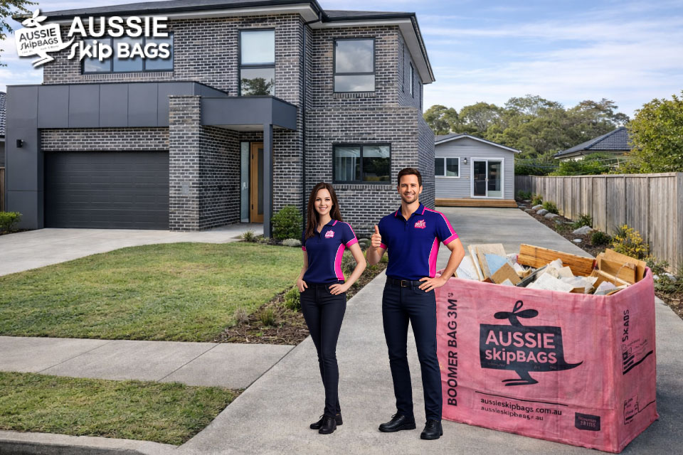 Waste Solutions for Granny Flat Builders article image of a boomer bag with Mia and Jack from Aussie Skip Bags waiting for our truck to collect the bag